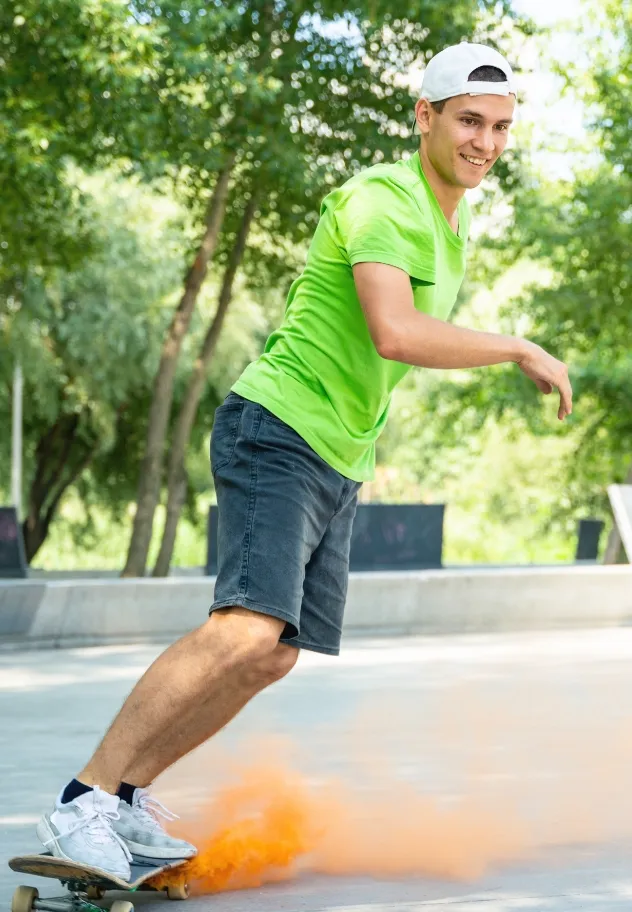 skaters with colored smoke bombs utc